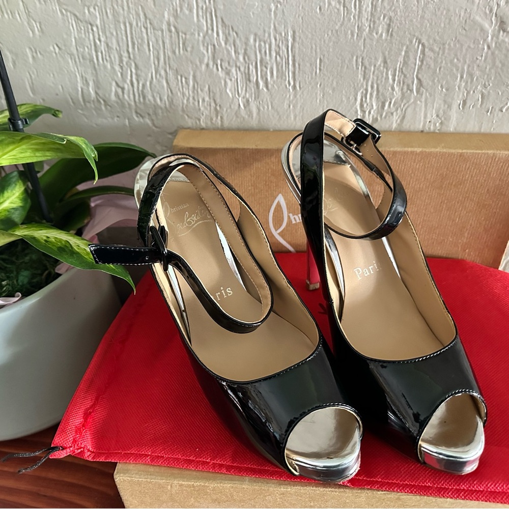 Christian  Loubutin women heels